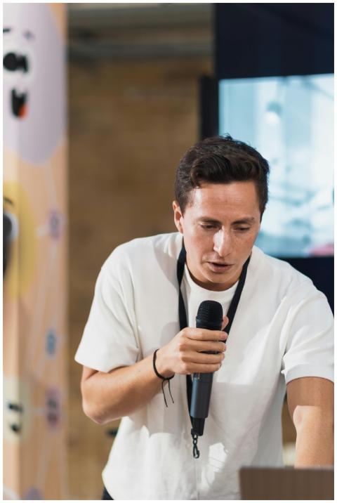 Professional man delivering a speech at an indoor