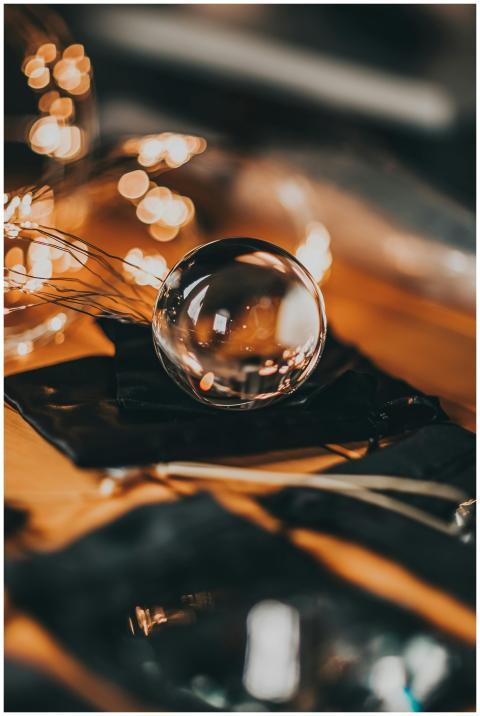 High angle of transparent glass ball placed on gif
