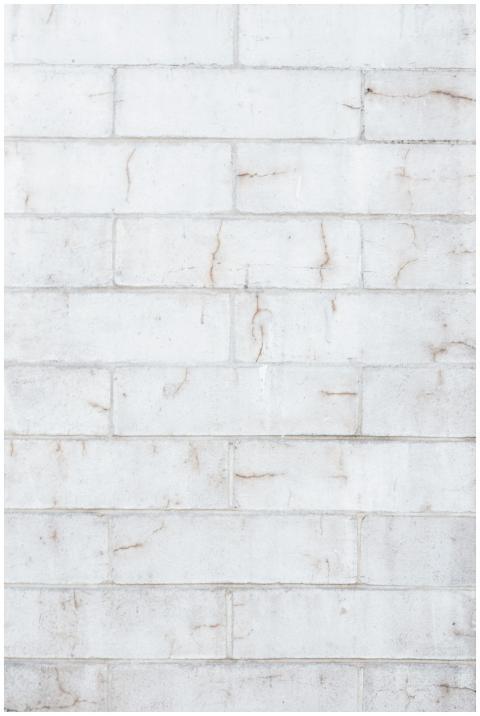 Clean and abstract white brick wall with a minimal