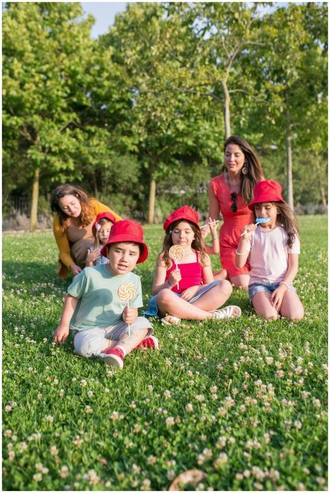 Group of children and adults enjoying a sunny day