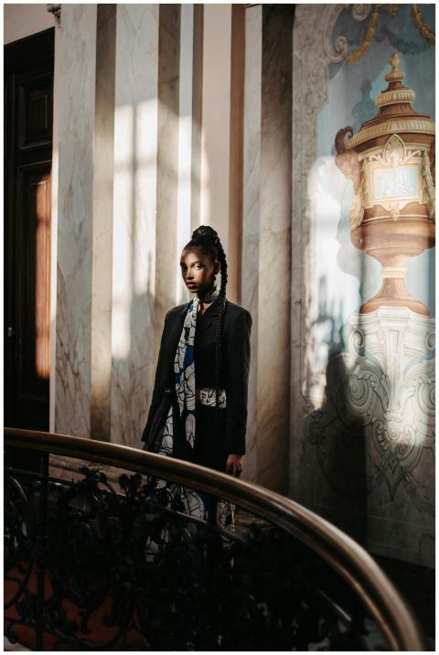 Artistic portrait of a woman in fashionable attire