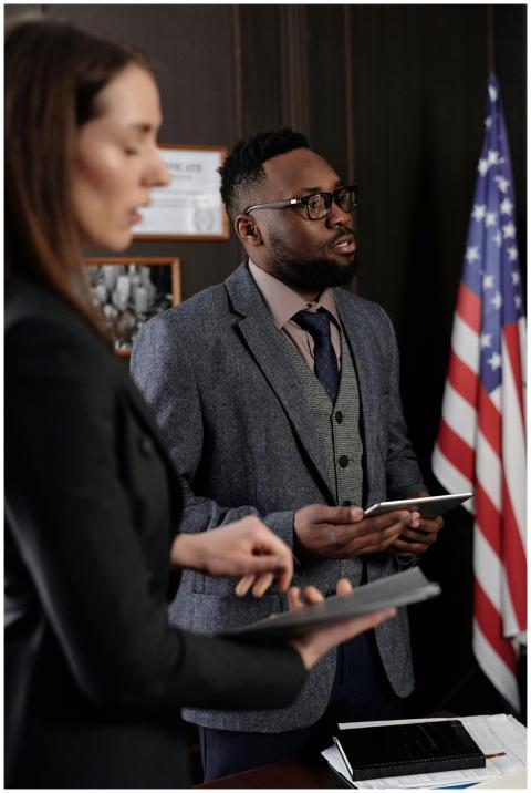 Business professionals discussing in an office wit