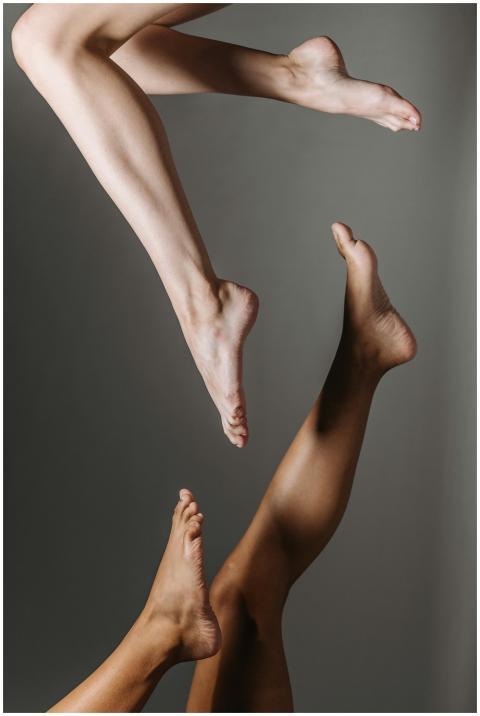 Artistic capture of bare feet gracefully suspended