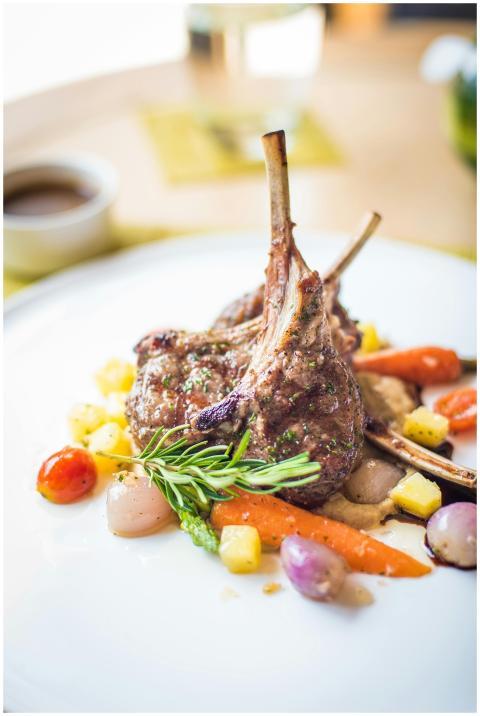Exquisite plated lamb chops with colorful vegetabl