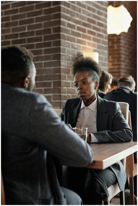 Two business professionals engaged in a discussion
