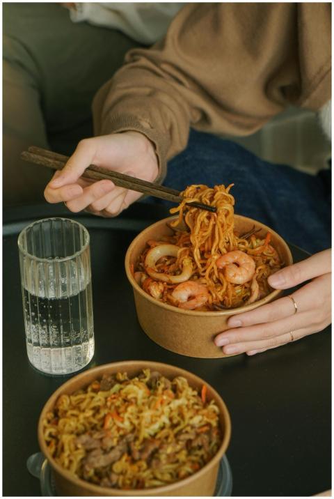 Close-up of shrimp noodle dish with chopsticks and