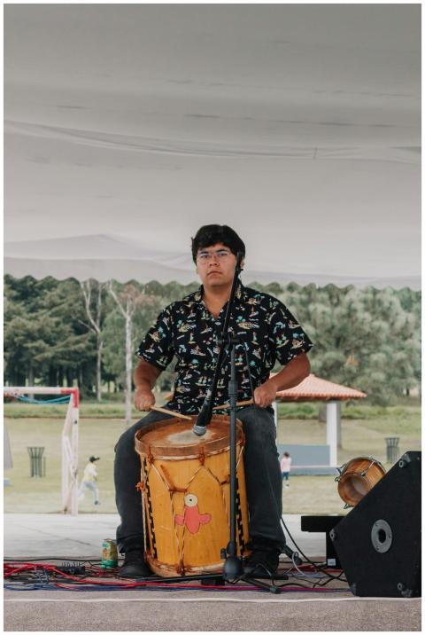 Man Playing Traditional Drum