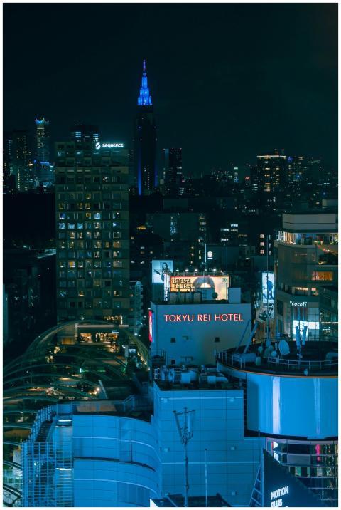 A vibrant night shot showcasing the bright lights