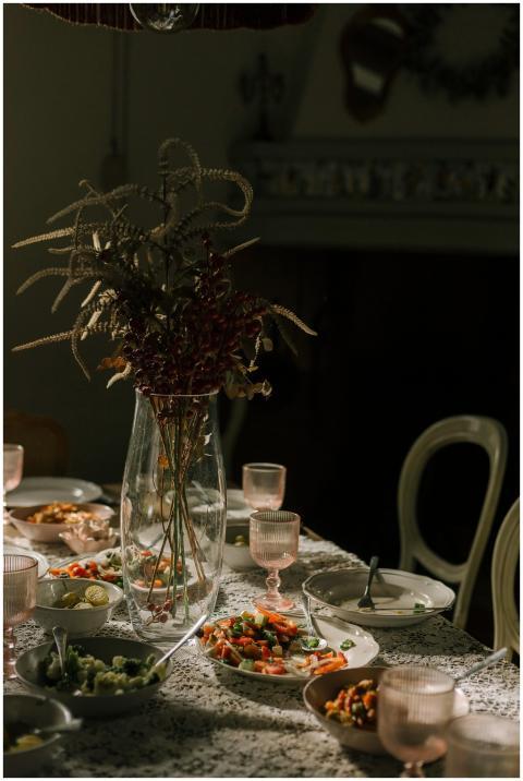 An intimate dinner setting with a floral centerpie