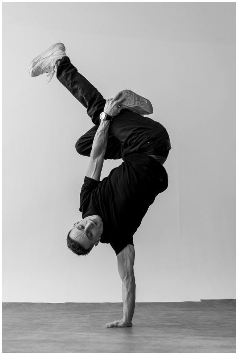 Captivating black and white image of a breakdancer