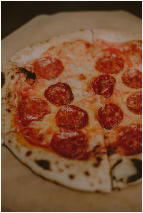 Delicious pepperoni pizza with a golden crispy cru