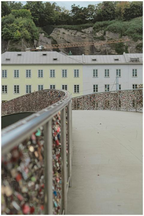 A beautiful bridge covered in love locks overlooki