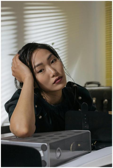 Portrait of a thoughtful businesswoman sitting in