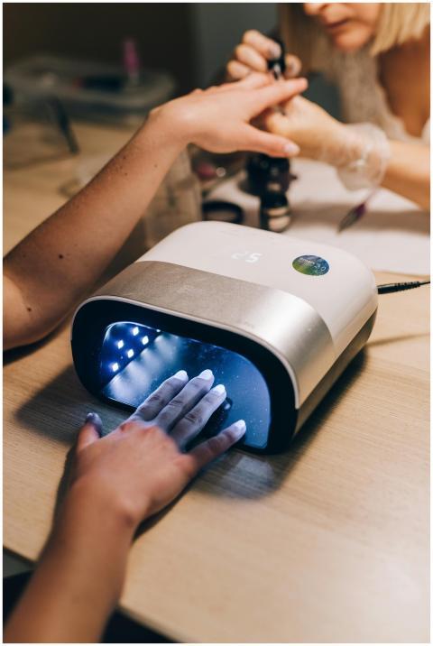 Close-up of a professional manicure using a nail d
