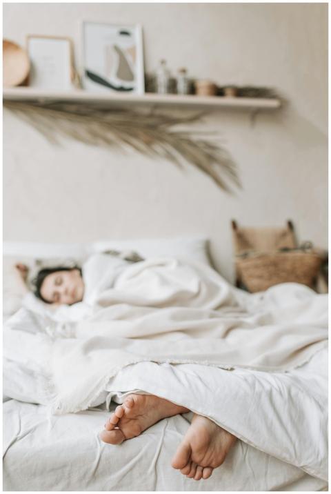 Relaxing indoor scene of a woman sleeping under a