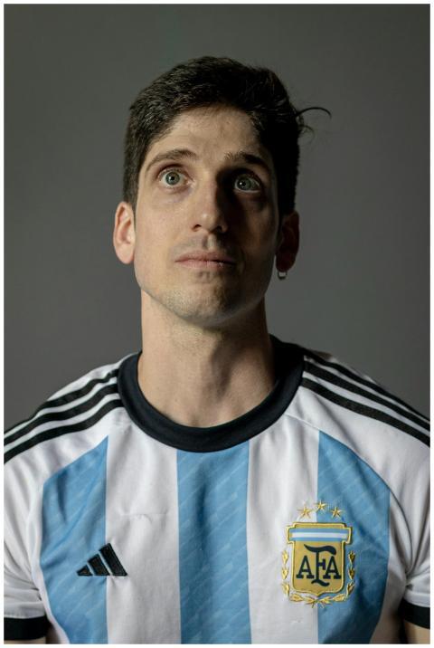 Close-up portrait of a man wearing an Argentina so