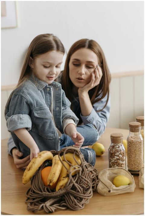 A mother and daughter engage in conversation aroun