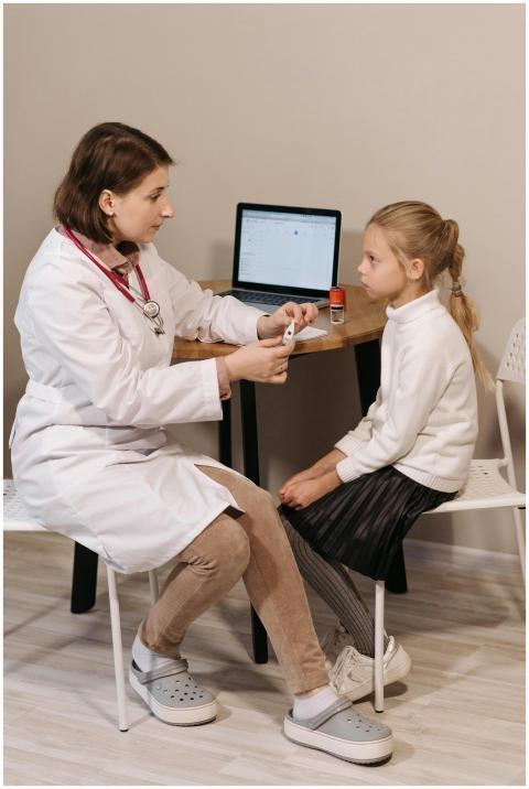 Doctor conducting a consultation with a child in a