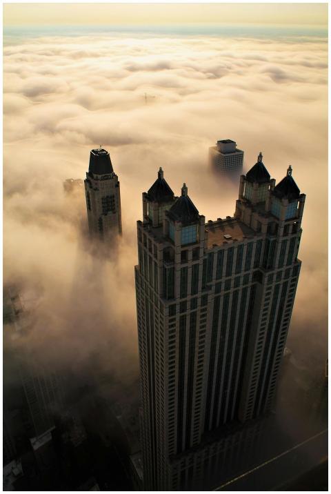 A breathtaking aerial view of skyscrapers piercing