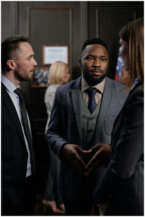 A group of diverse business professionals engaged