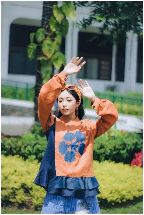 Stylish young woman posing with natural elegance i