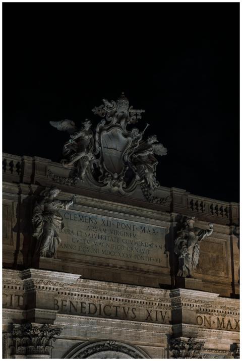 Baroque architectural detail in Rome at night, fea