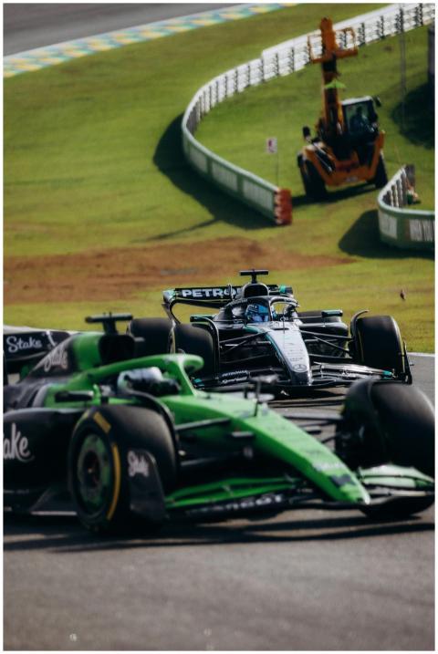High-speed action shot of Formula 1 cars racing at