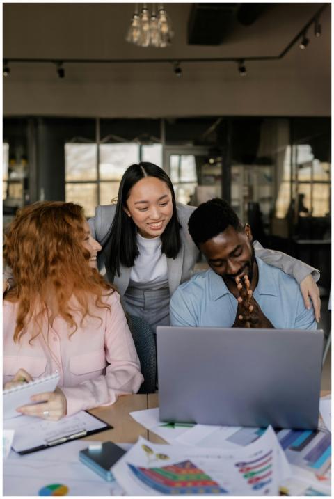 A diverse group of adults collaborating on a proje