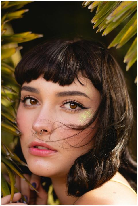Stunning portrait of a young woman with brown eyes