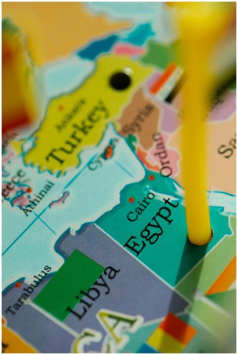 Close-up of a colorful world map highlighting Egyp