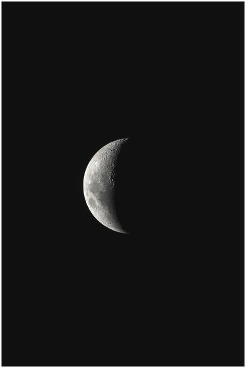 A detailed view of the crescent moon set against a