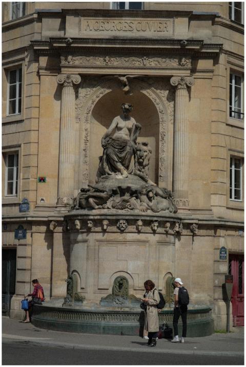 A detailed view of the A. Georges Cuvier statue in