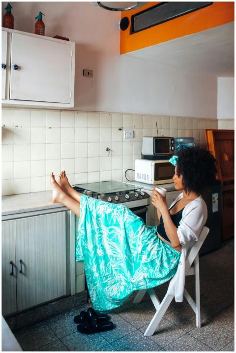 Woman enjoying a tranquil morning with coffee in a