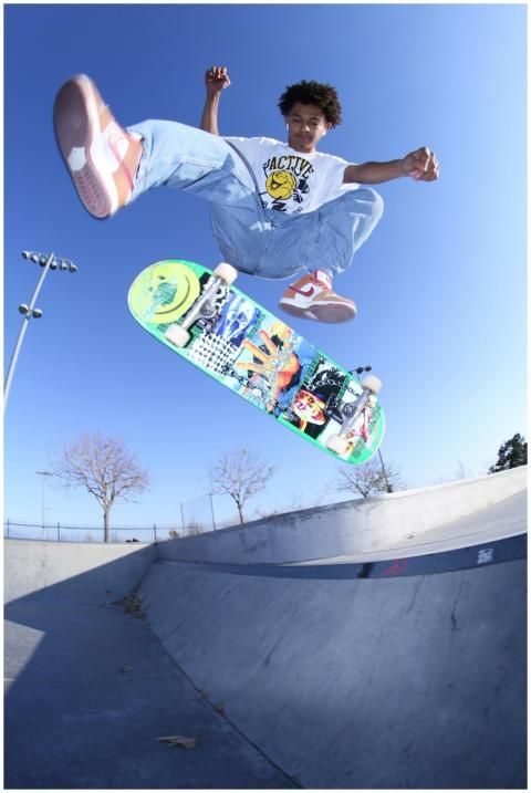 A dynamic image of a teenager executing a mid-air