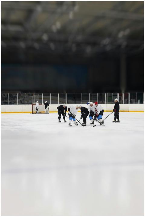 Group of hockey players engaged in practice sessio
