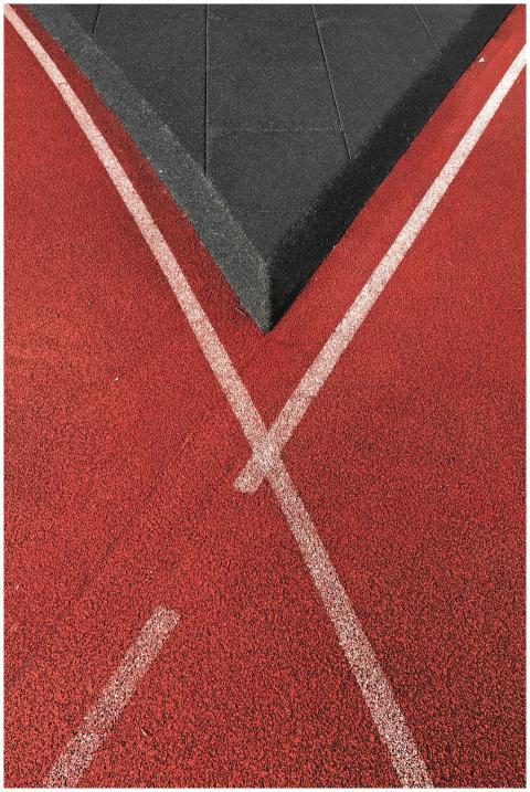 Close-up of a track with red surface and geometric
