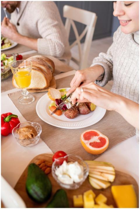 A cozy family breakfast scene with fresh fruits, v