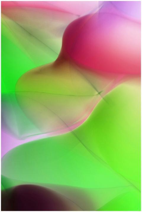 Vivid abstract artwork featuring fluid light waves