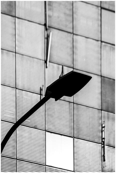 Modern Streetlight Against Urban