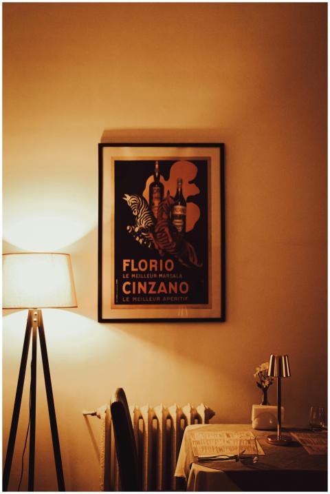 Warm, vintage-themed interior featuring a framed C