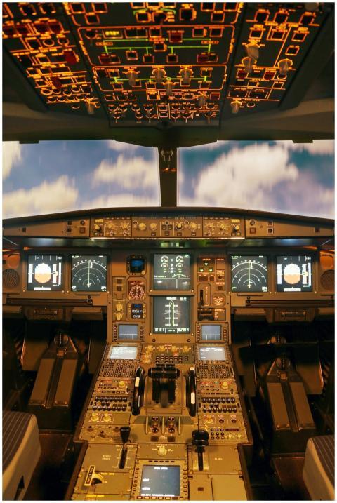 Interior view of an advanced airplane cockpit with