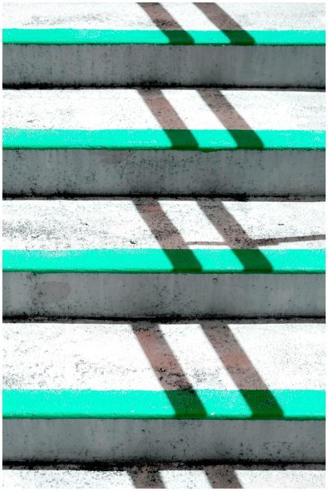 Artistic photo of concrete stairs with green strip