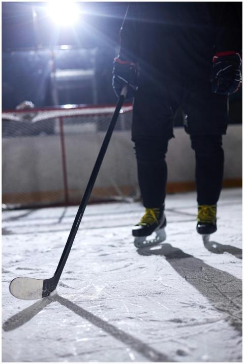 Close-up shot of a hockey player practicing at an