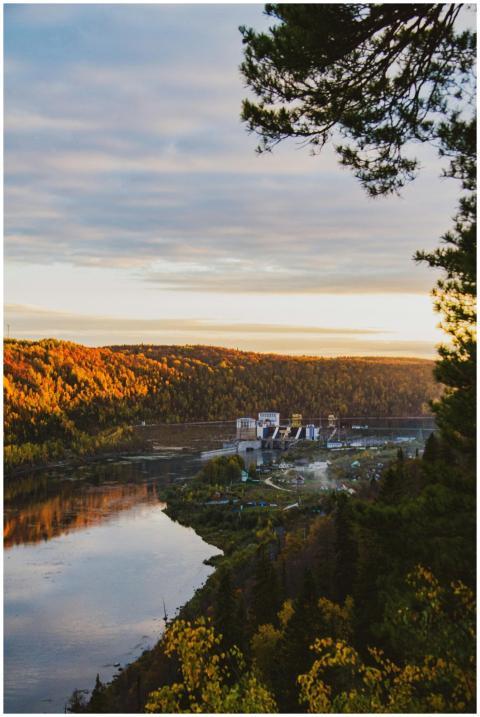 A beautiful autumn landscape featuring a river and