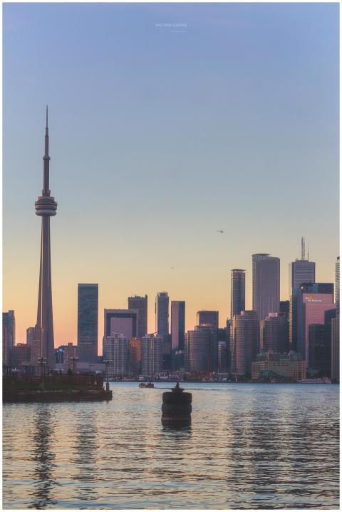 Beautiful sunset view of Toronto's skyline featuri