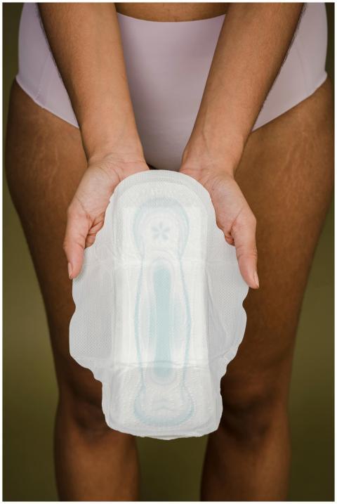 From above of crop anonymous female showing clean