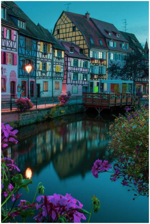 Scenic view of Colmar's colorful houses reflecting