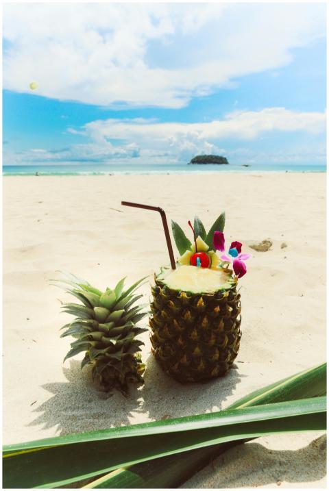 Tropical pineapple beverage with a straw on Phuket