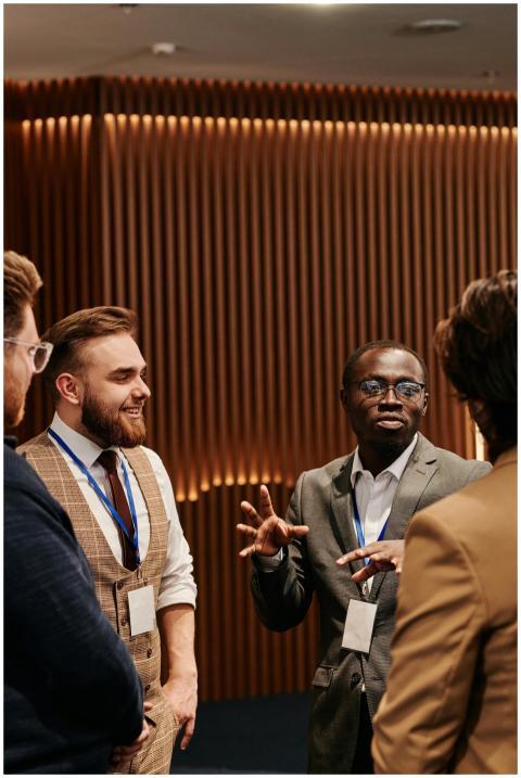 Business professionals in corporate attire having