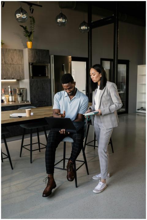 Two professionals engaged in a business discussion